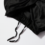 dettaglio cuffia notte seta regolabile con cordini ed elastico